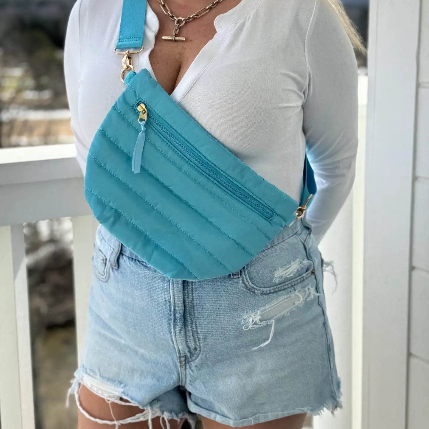 Turquoise Crescent Puffer Sling Bag