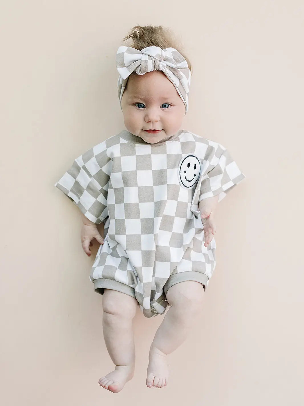 Short Sleeve Bubble Romper | Checkered Smiley Latte
