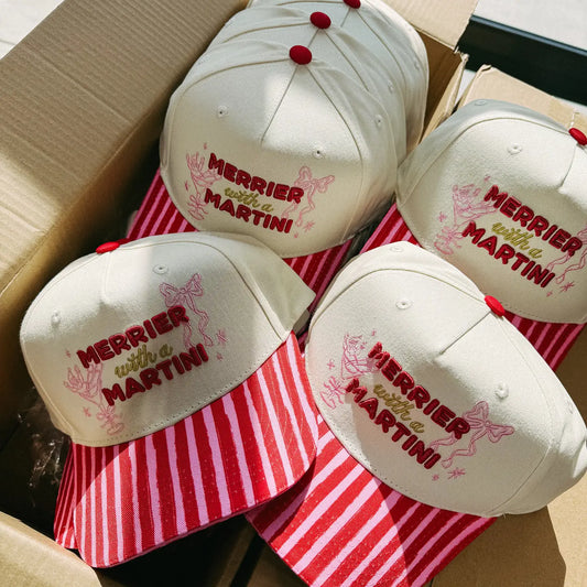 Merrier with A Martini Trucker Hat - Cream / Red / Pink