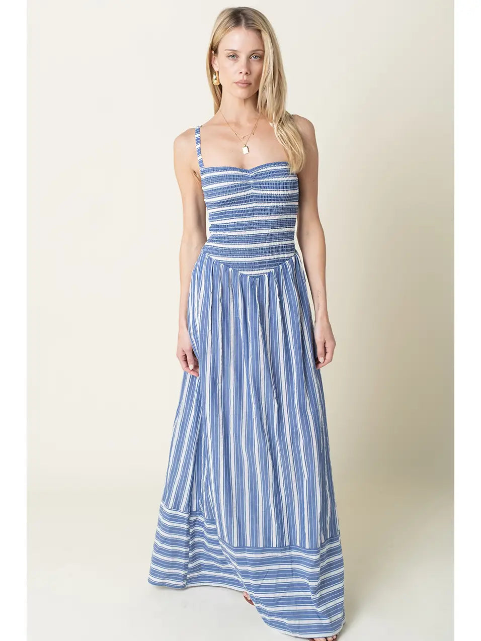 blue and white striped bridesmaid dresses bridesmaids-in-navy-and-white-striped-dresses