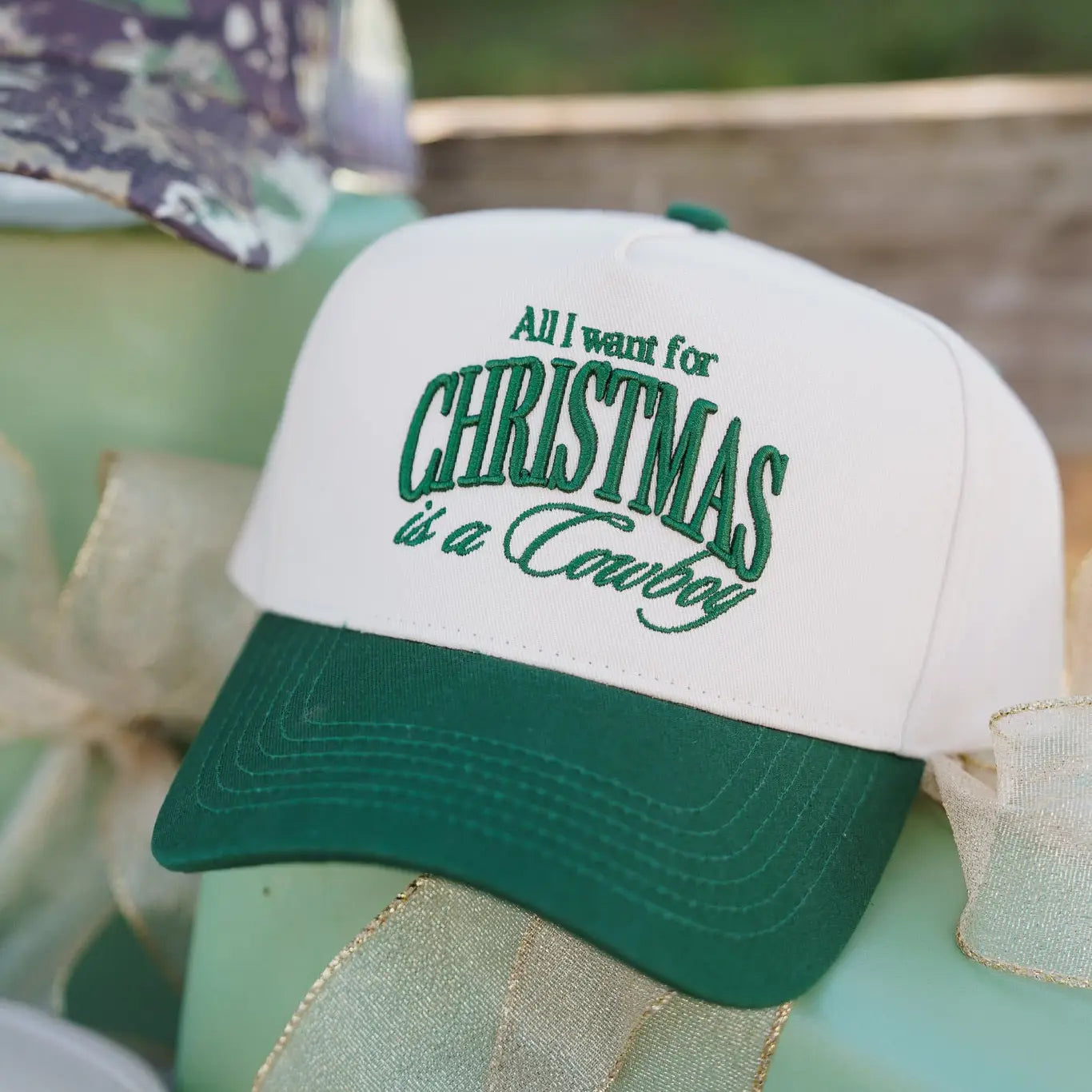 All I Want For Christmas Is A Cowboy - Green Vintage Trucker Hat